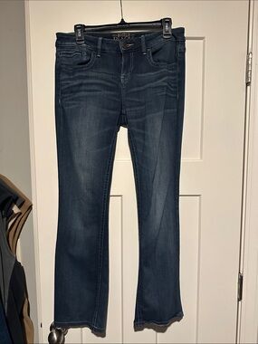 Buckle Black dark wash boot cut blue jeans
